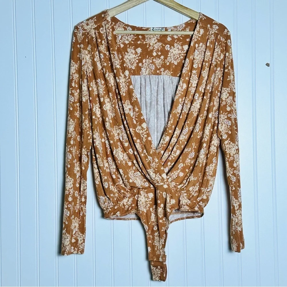 FREE PEOPLE Turnt Surplice Bodysuit in a copper floral print Medium NWT - Picture 5 of 11